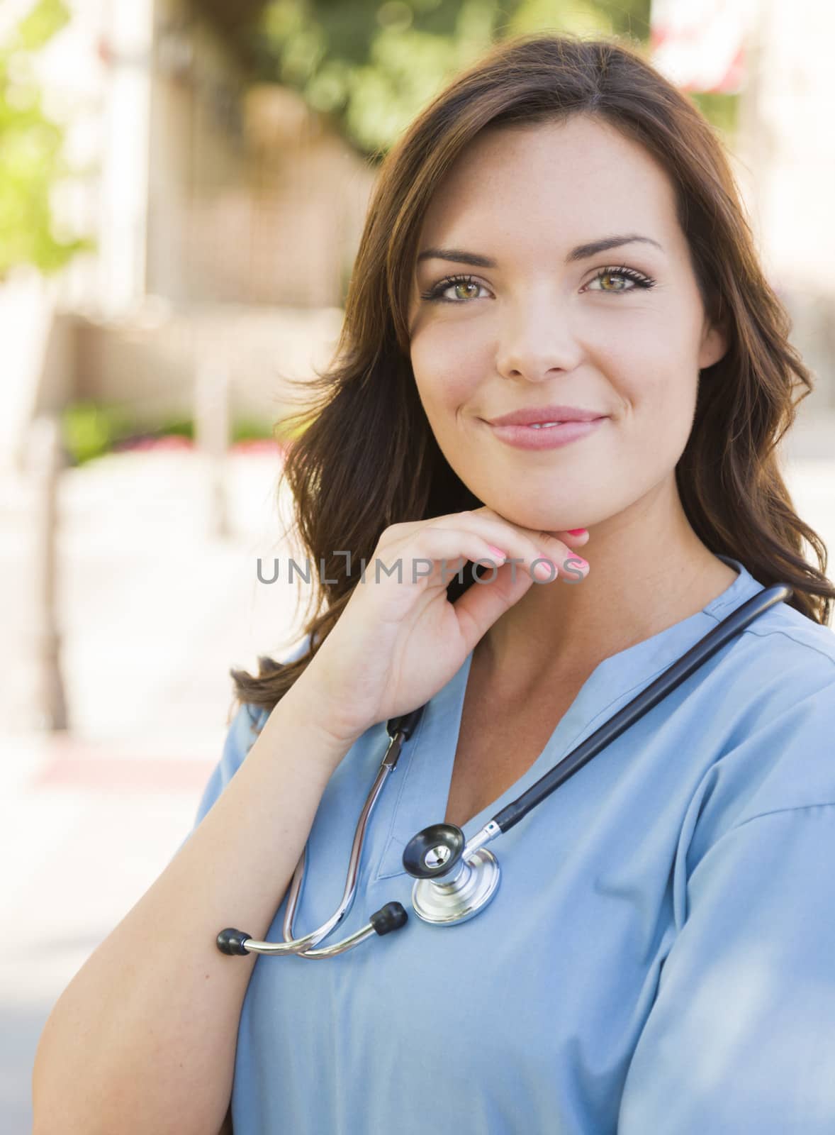 Young Adult Woman Doctor or Nurse Portrait Outside by Feverpitched