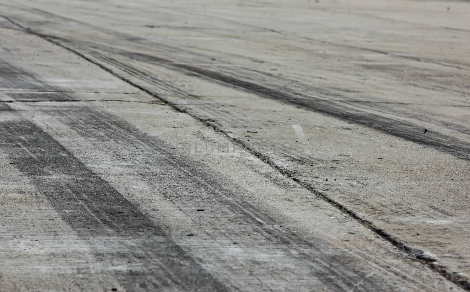Background with tire marks on road track
