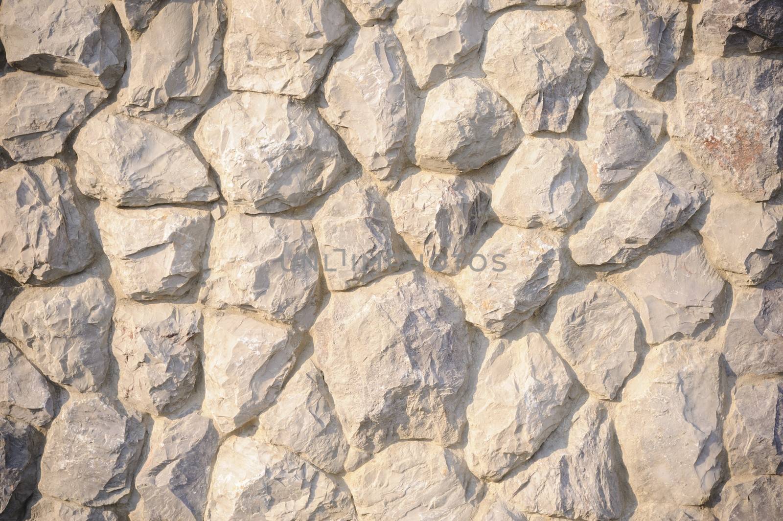 Abstract surface of the stone wall. by ngungfoto