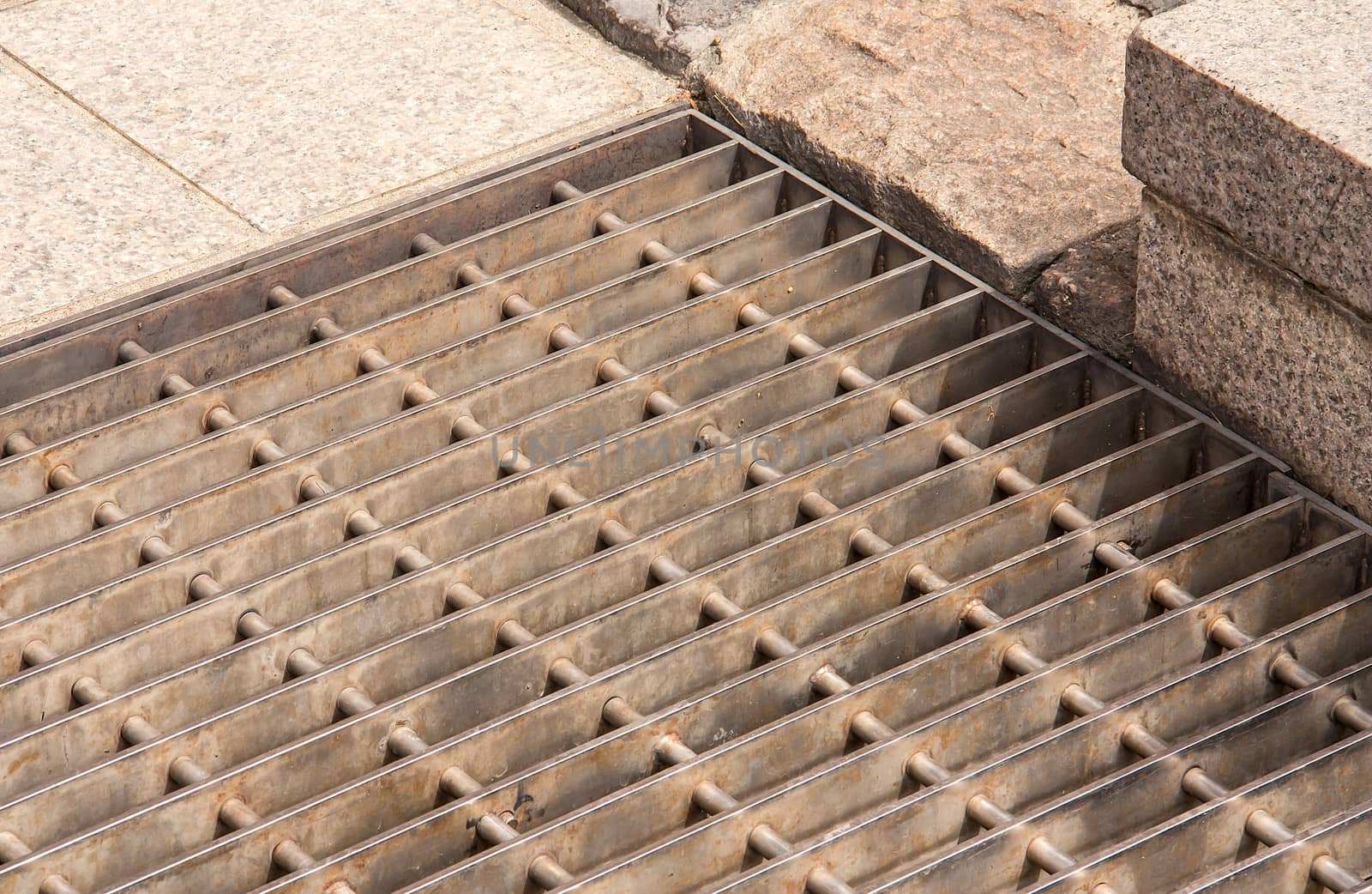 Iron grate off the drain.