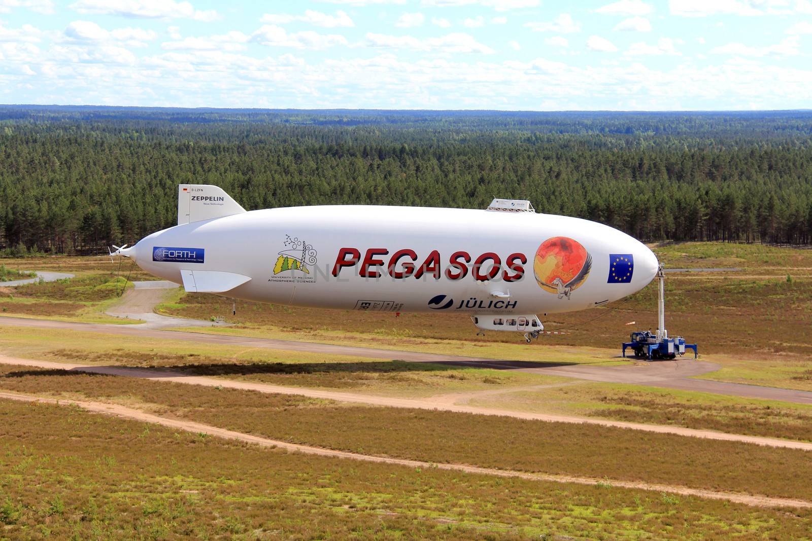 JAMIJARVI, FINLAND - JUNE 15, 2013: Pegasos Zeppelin NT airship attached to mast in Jamijarvi, Finland on June 15, 2013 after completing the ca. 30 research flights as part of the European PEGASOS project.