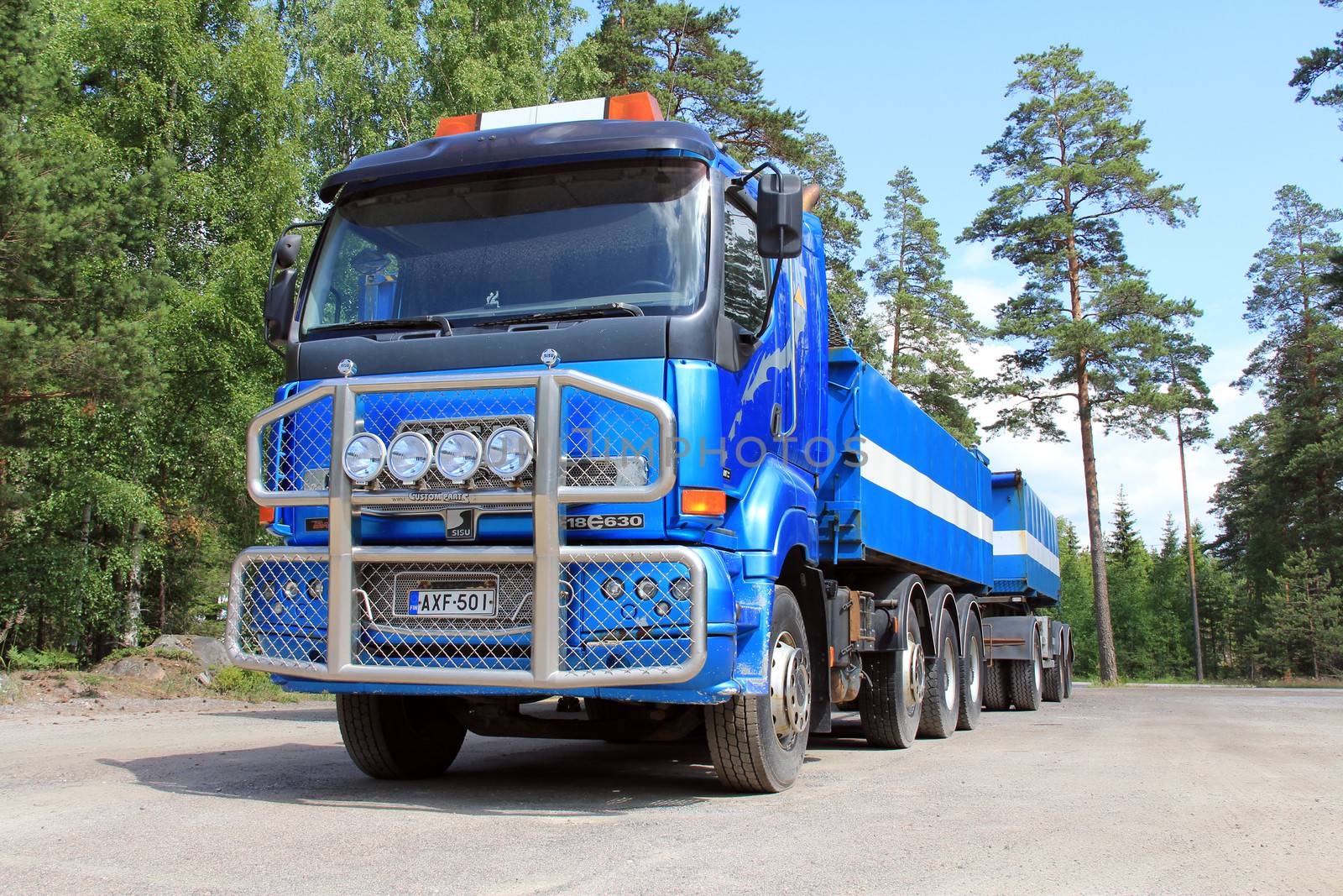 TAMMISAARI, FINLAND - JULY 6, 2013: Sisu 18E630 heavy duty truck parked in Tammisaari, Finland on July 6, 2013. Sisu Auto Finland prepares for a peak in demand for Euro 5 series of trucks due to the new Euro 6 emission regulation coming into force next year.