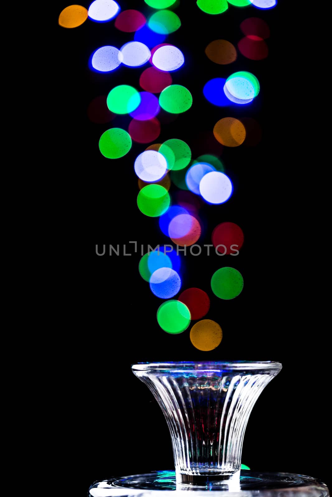 Light bubbles coming out of a glass by derejeb