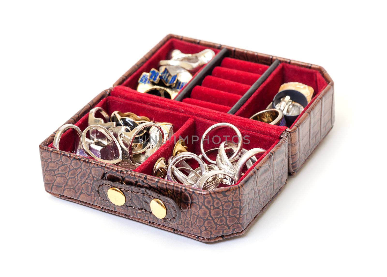 Leather jewelry box with rings, closeup on white background