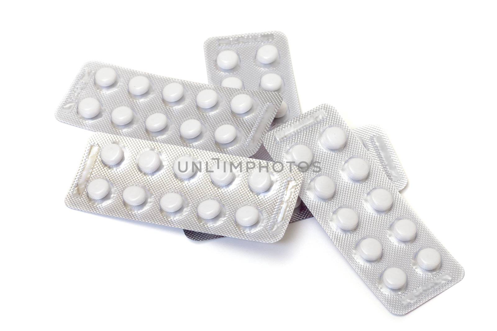 White pills packed in blisters by Discovod