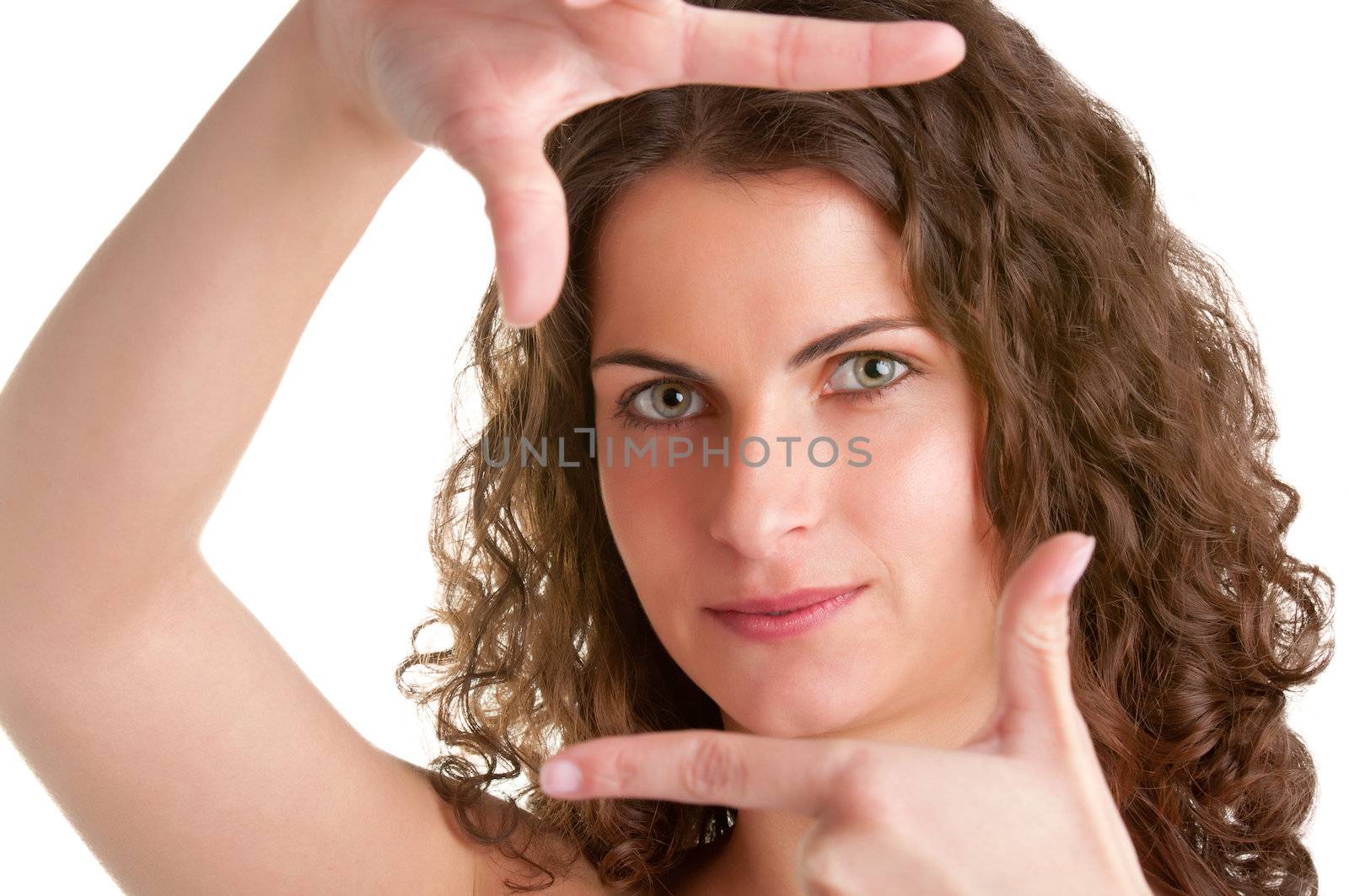 Woman framing a picture with her hands, isolated in white