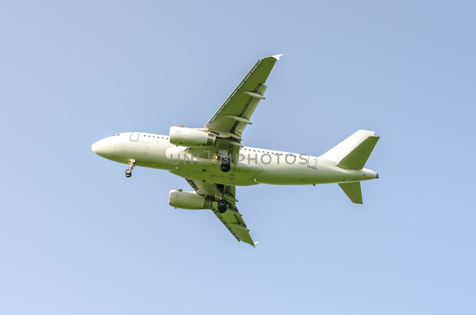 Airplane on a clear blue sky.