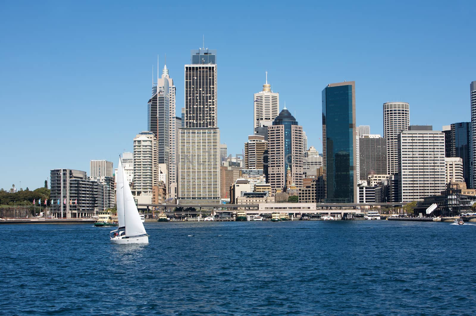 Sydney view with City skyline in the background and boat in the water, Australia
