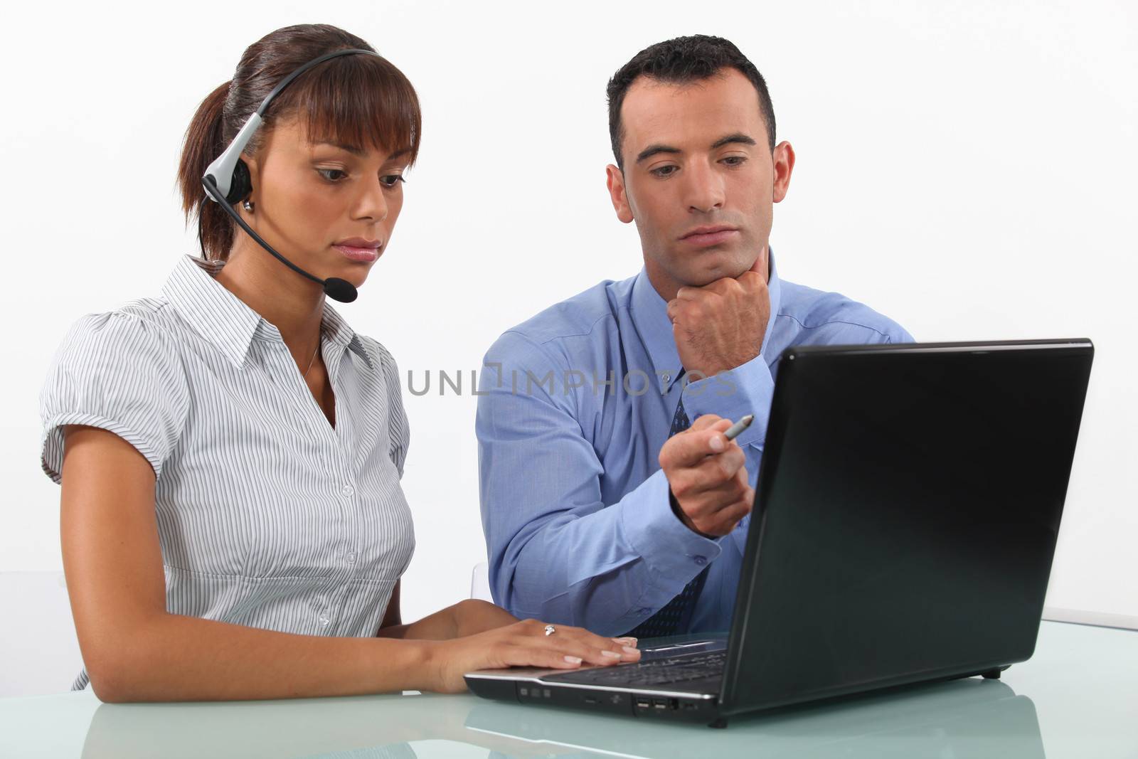 Business couple with a laptop