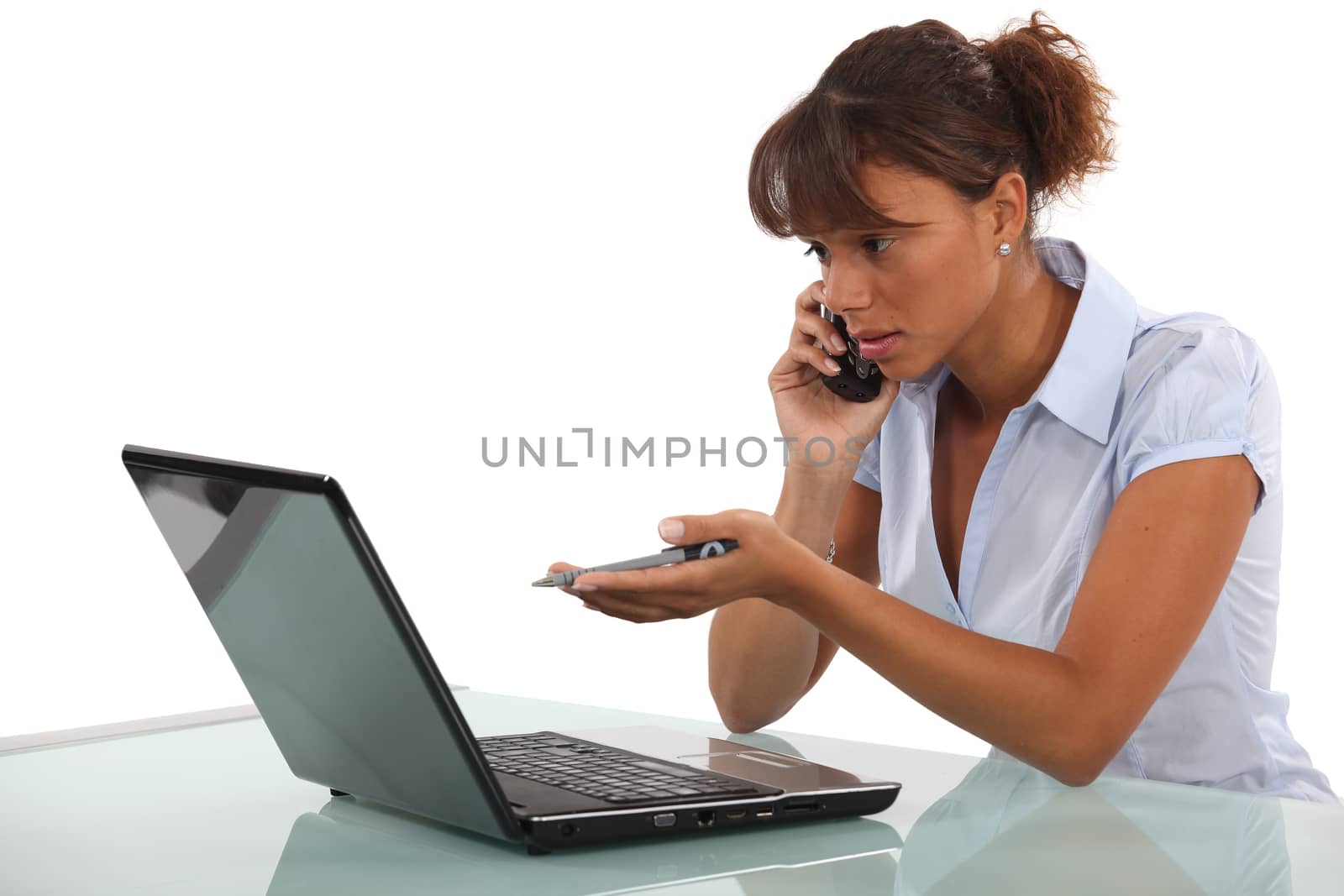Businesswoman calling technical help desk by phovoir