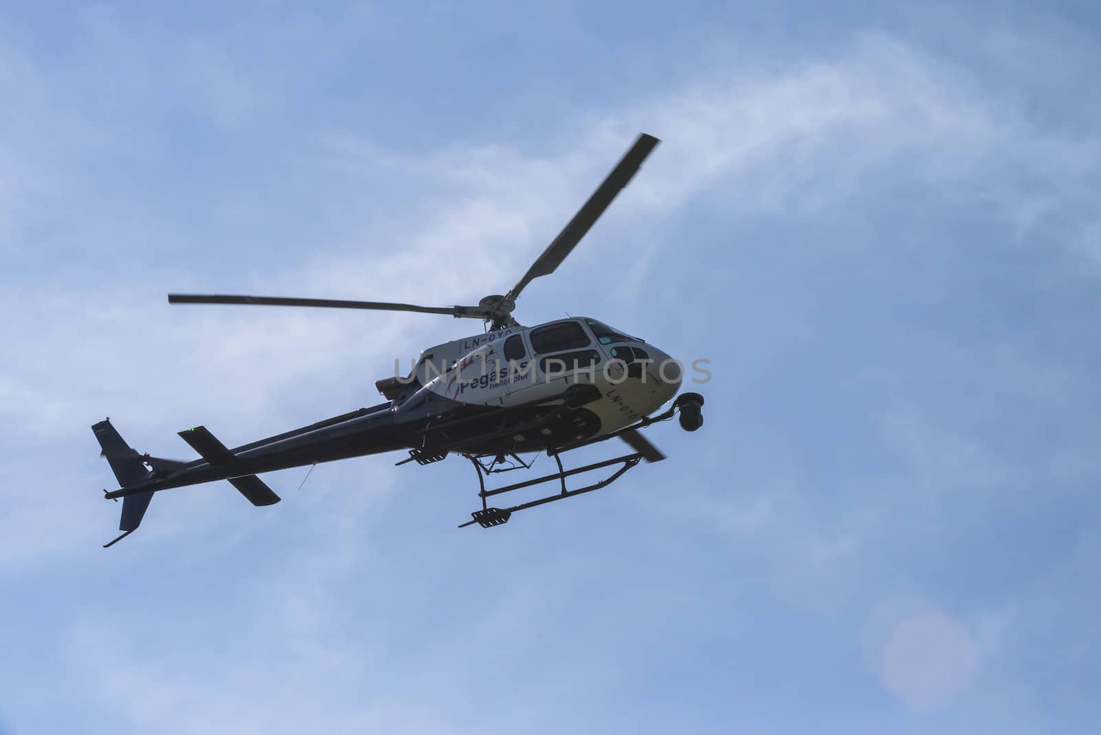 A helicopter flying over Fredriksten fortress in Halden, Norway, and taking pictures