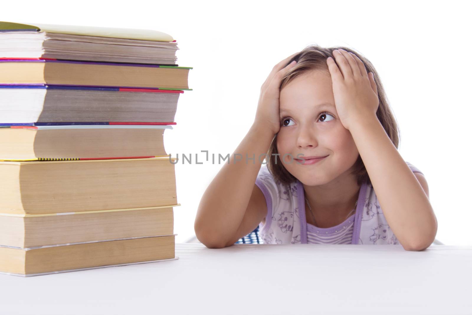 Stressed schoolgirl with pile of books isolated over white