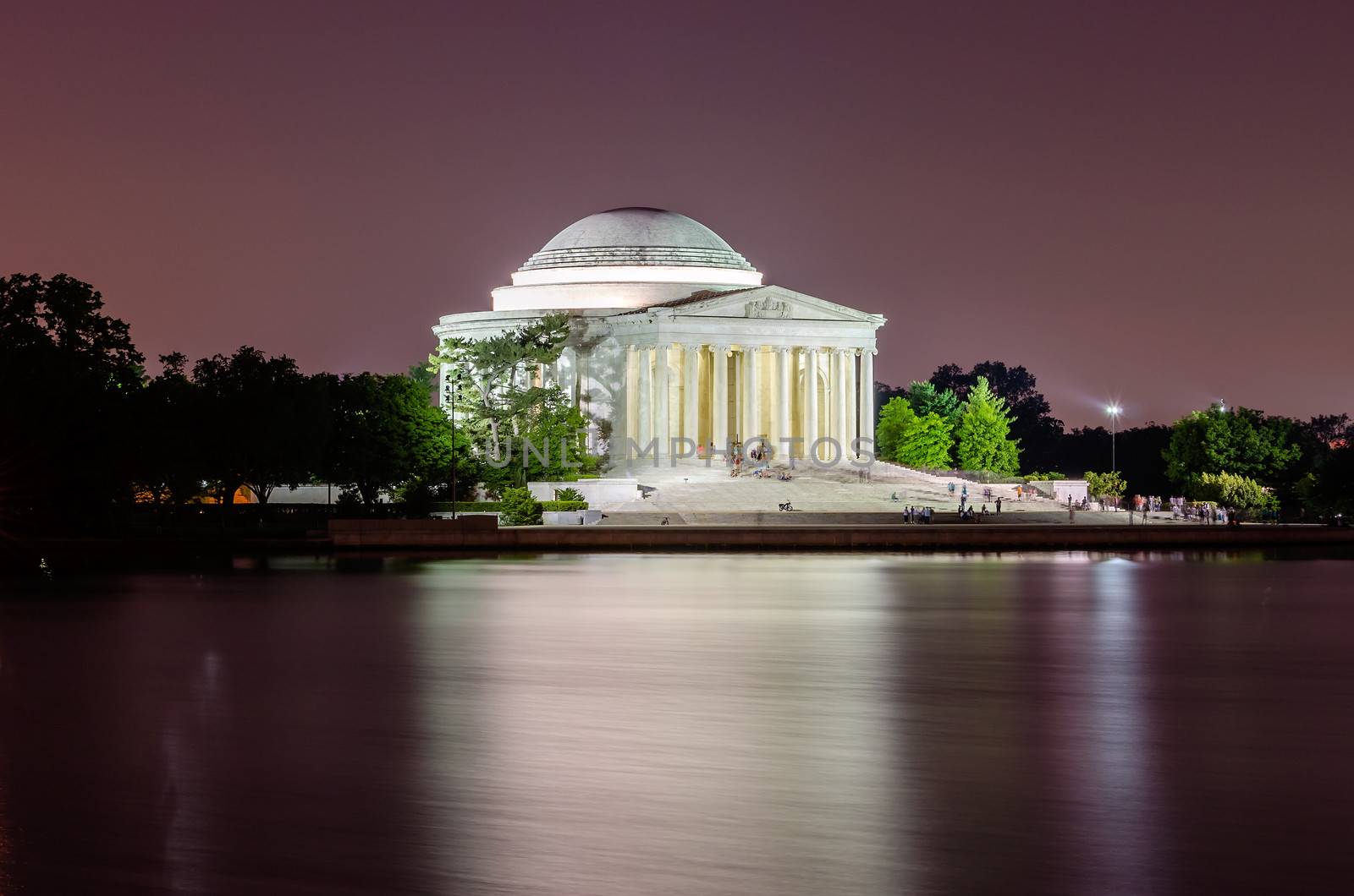Scenic night view of the Jefferson Memorial in Washington DC reflecting in the Tidal Basin