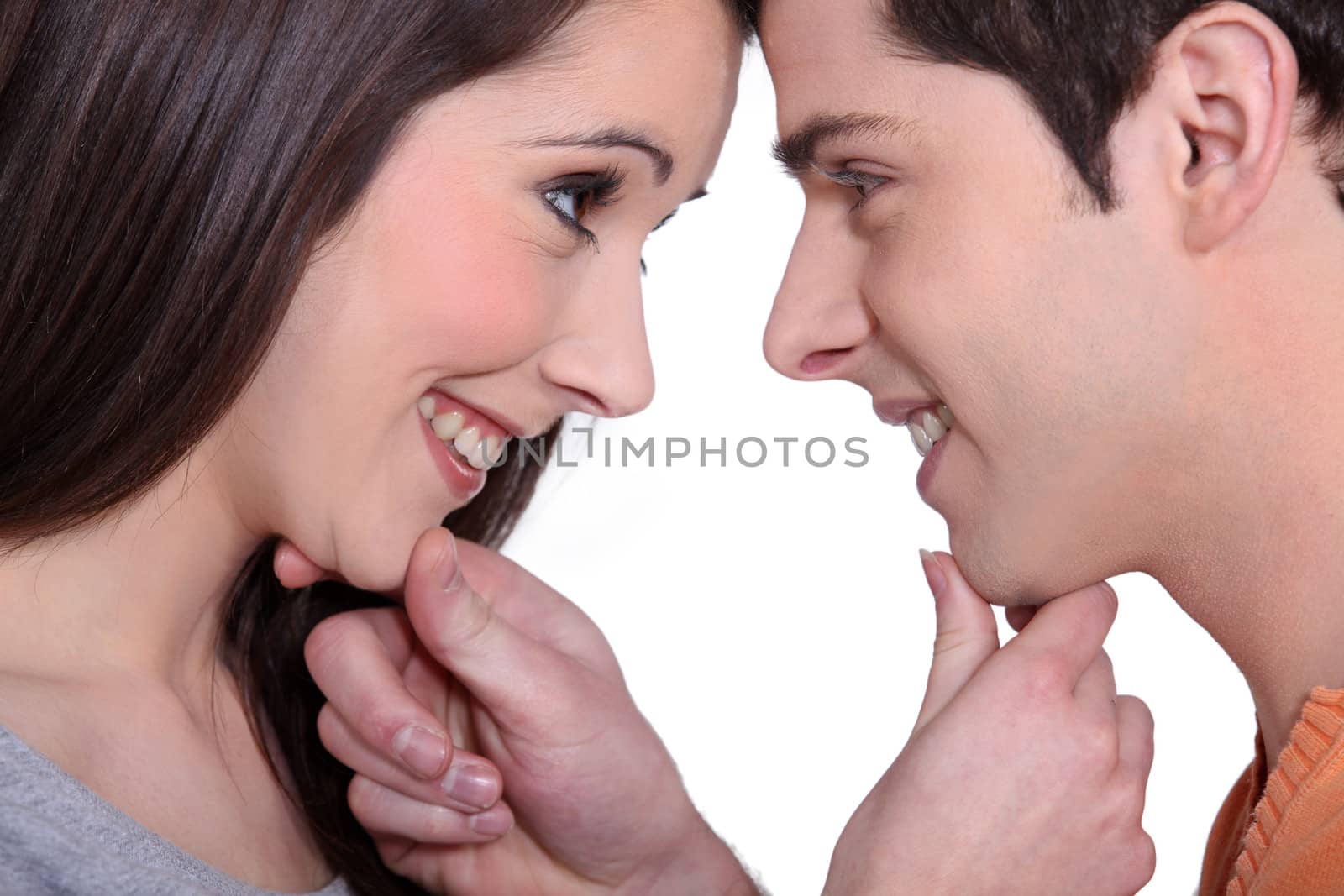 Young couple gazing lovingly into each other's eyes