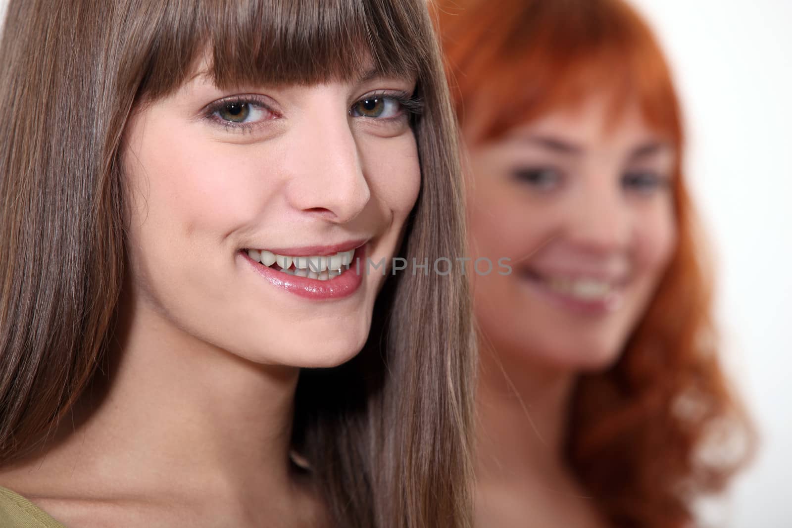 two young women posing