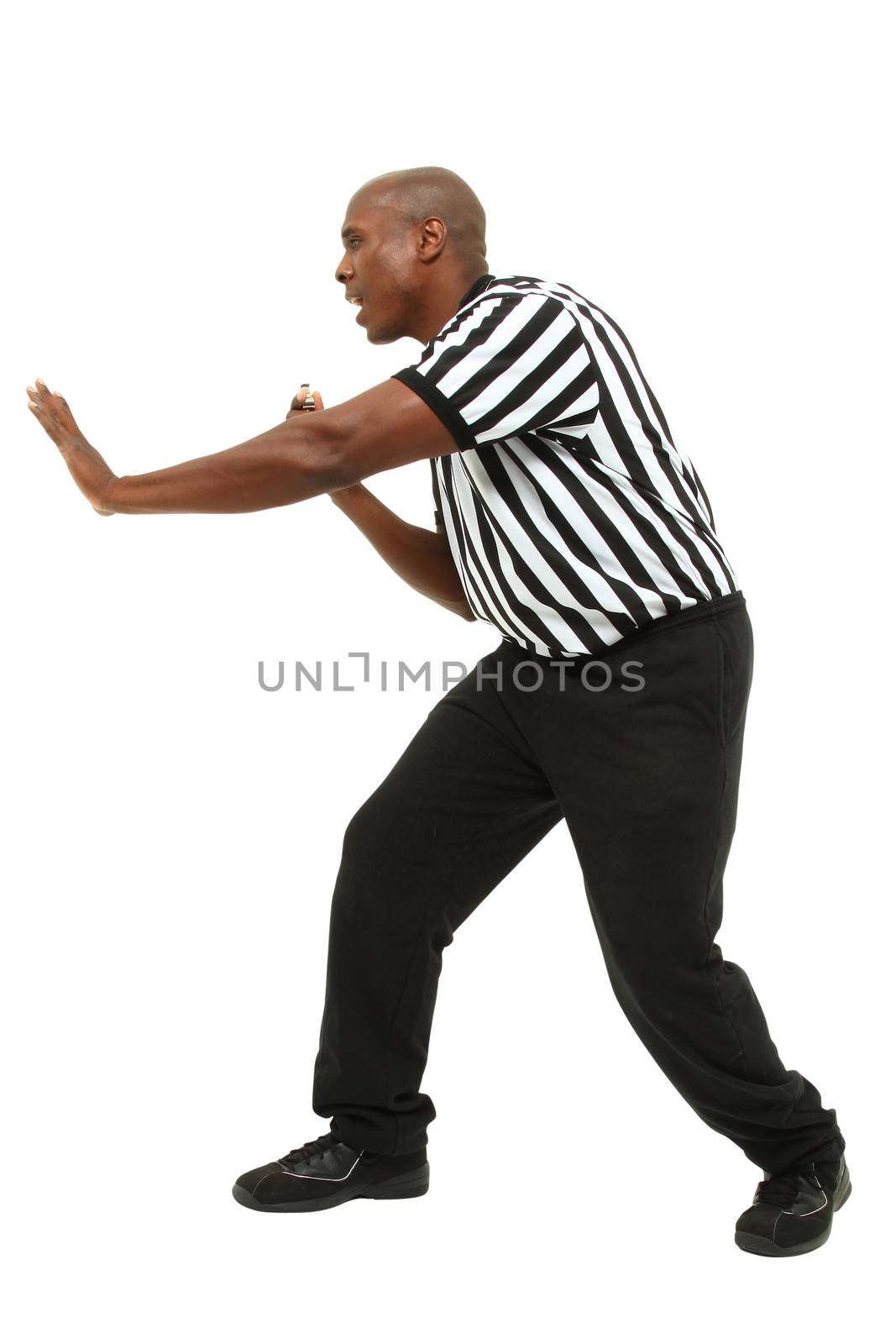 Attractive fit black man in referee uniform facing side and yell by duplass