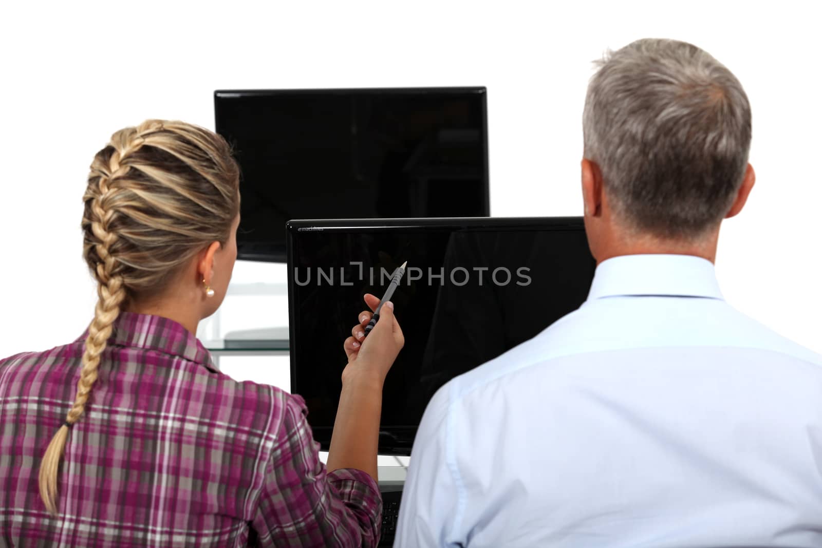 Boss and female assistant having discussion