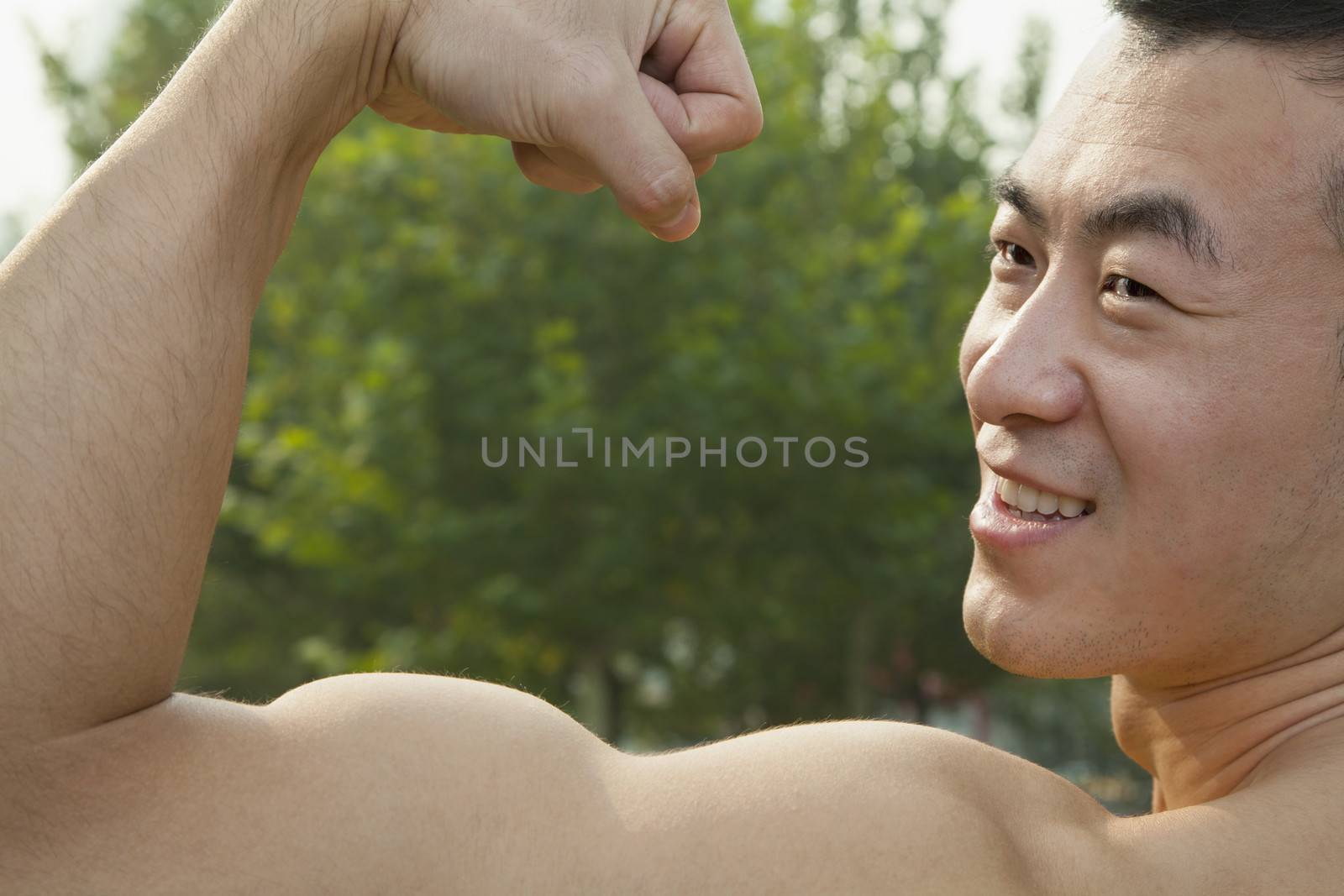 Man Flexing Muscles