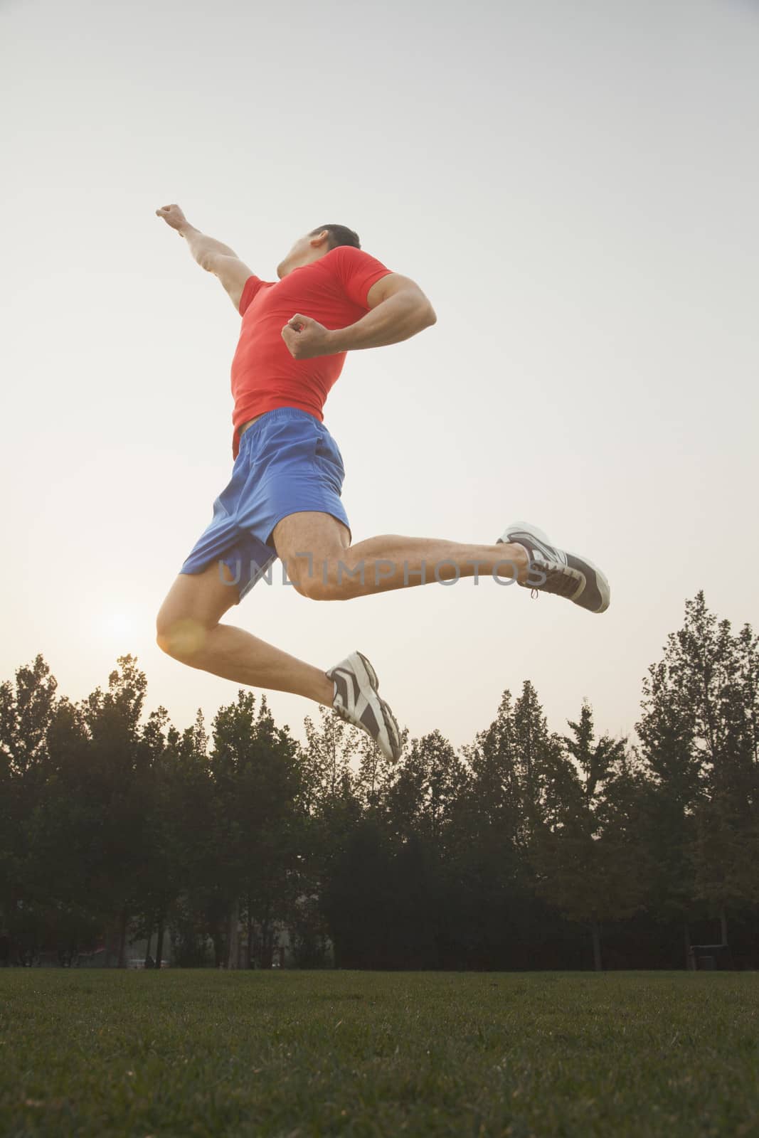 Muscular Man Jumping