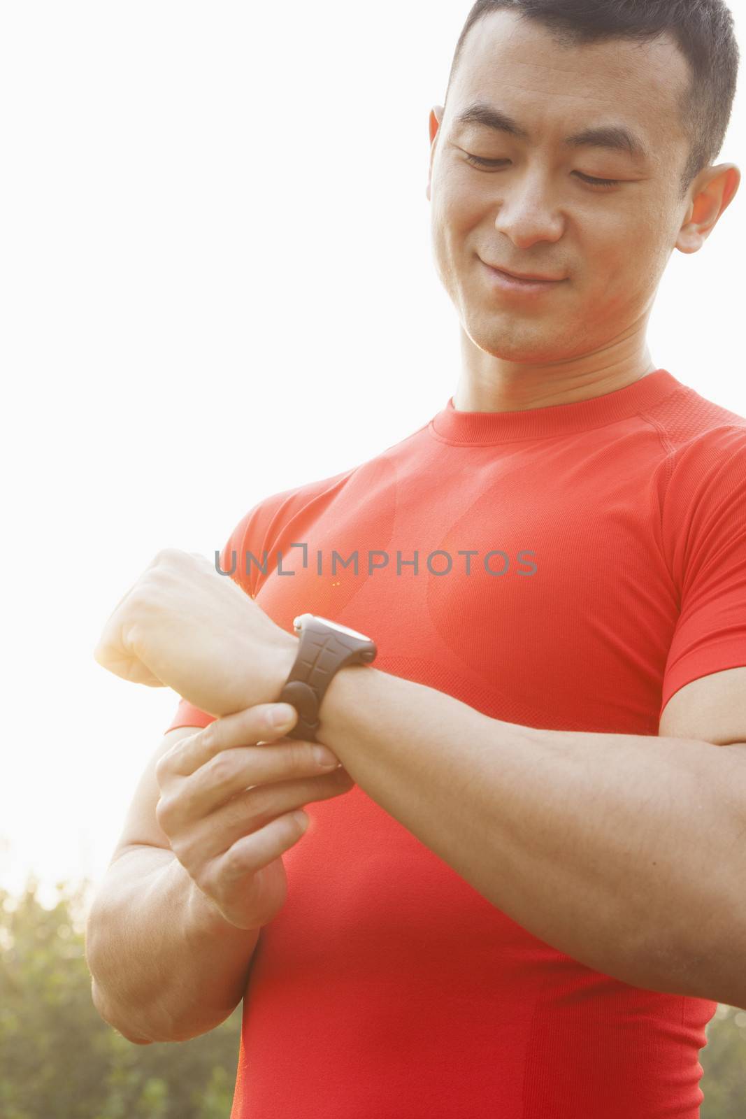 Muscular Man Checking His Watch