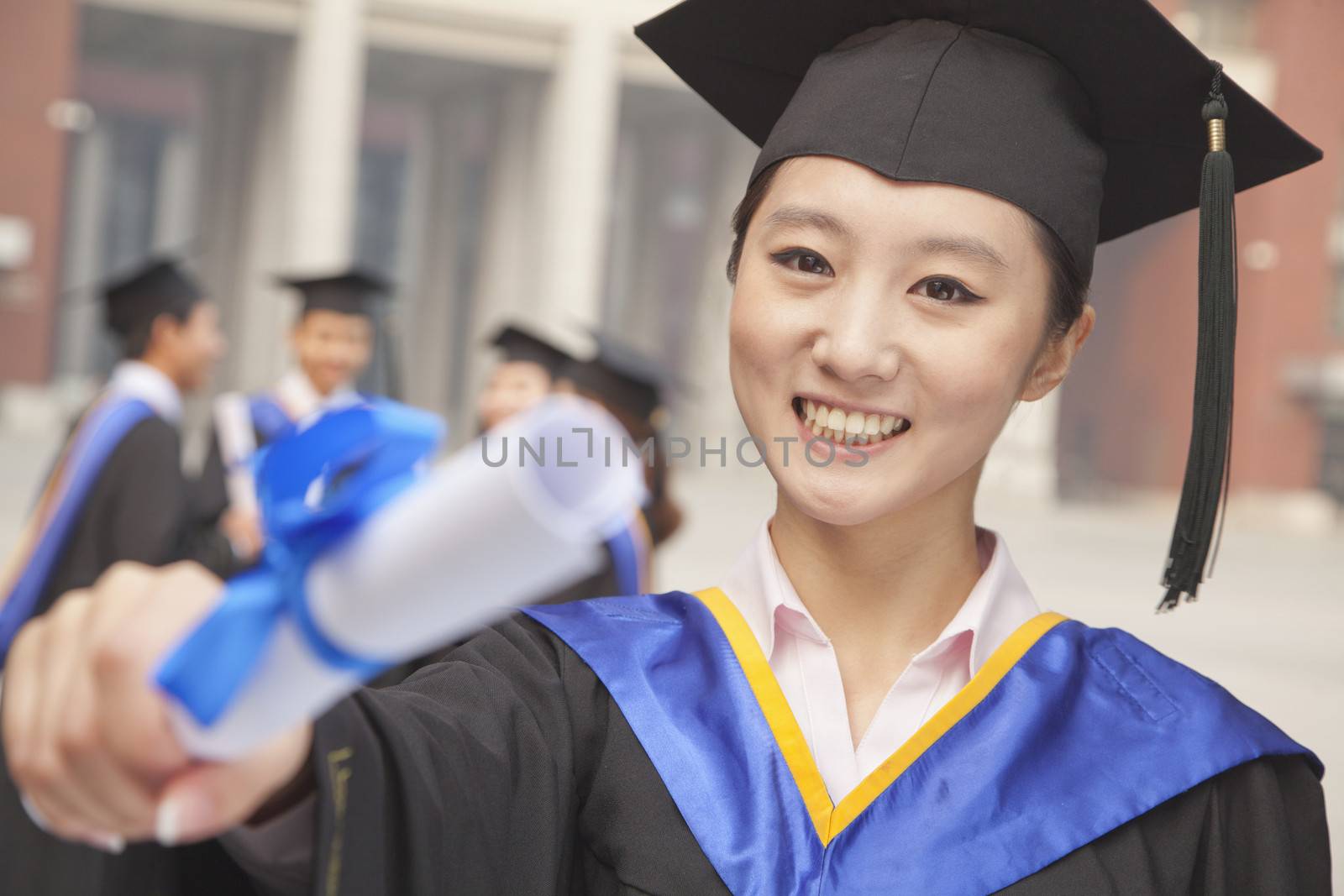 Young Female Graduate Holding Diploma by XiXinXing