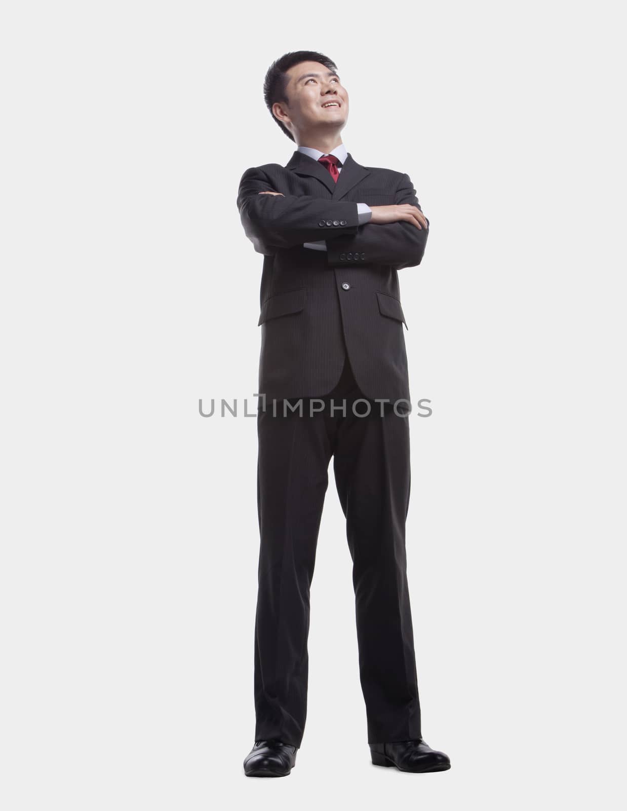 Businessman Looking Up, Full Length