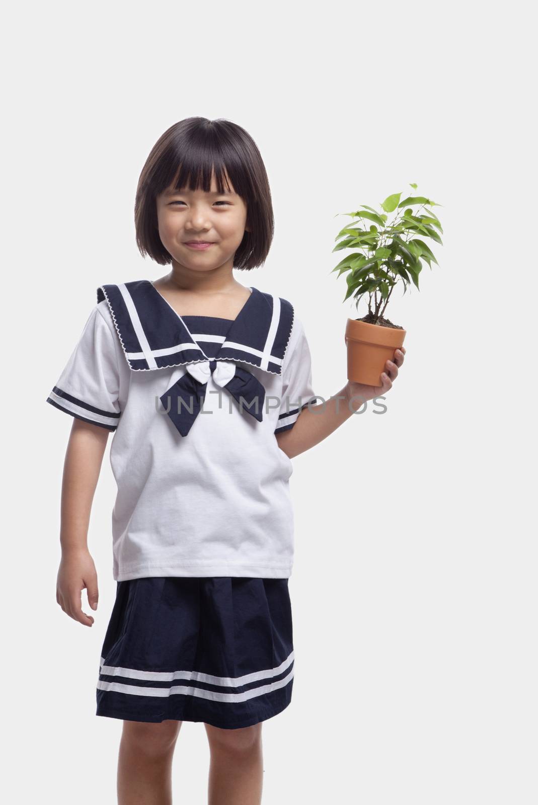 Girl Holding Potted Plant