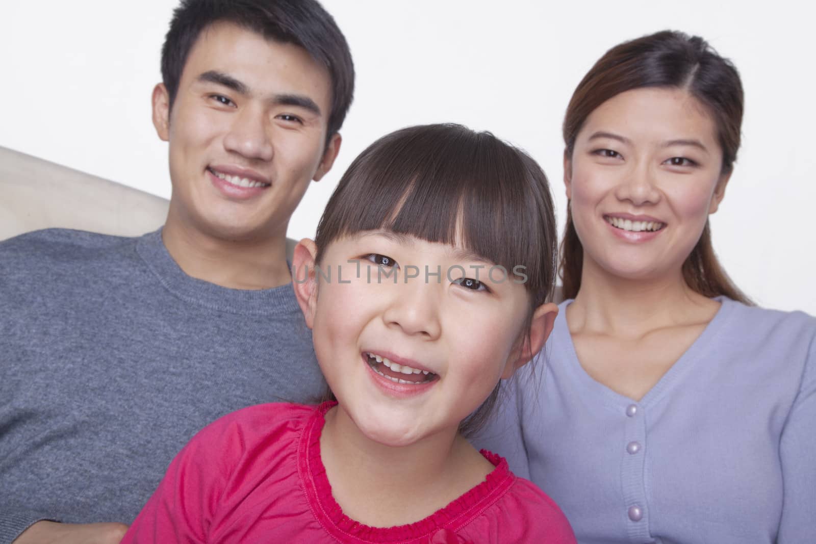 Portrait of Family, studio shot, tilt