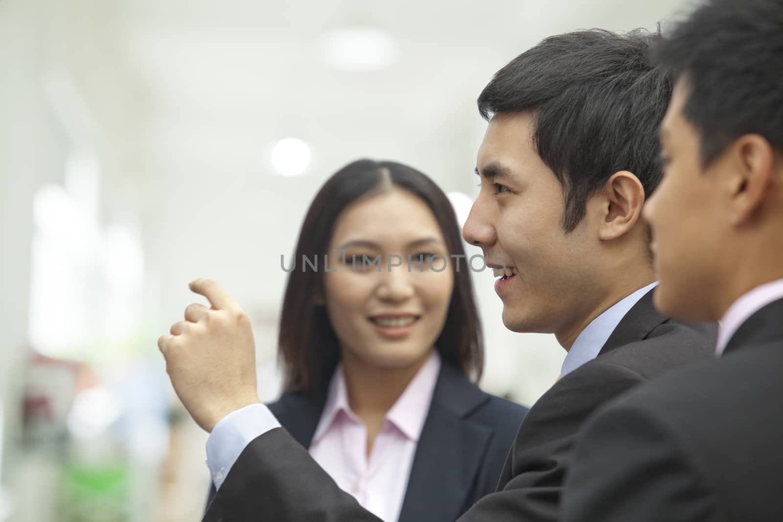 Business People Looking at Wall