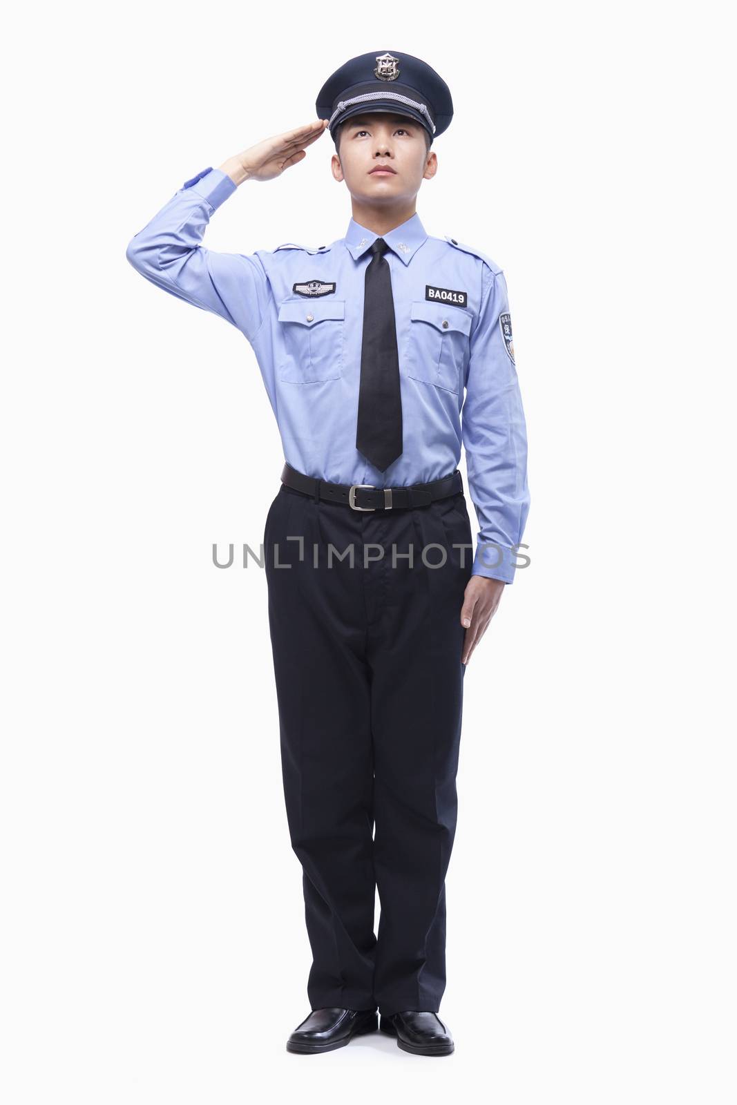 Police Officer Saluting, Studio Shot, full length