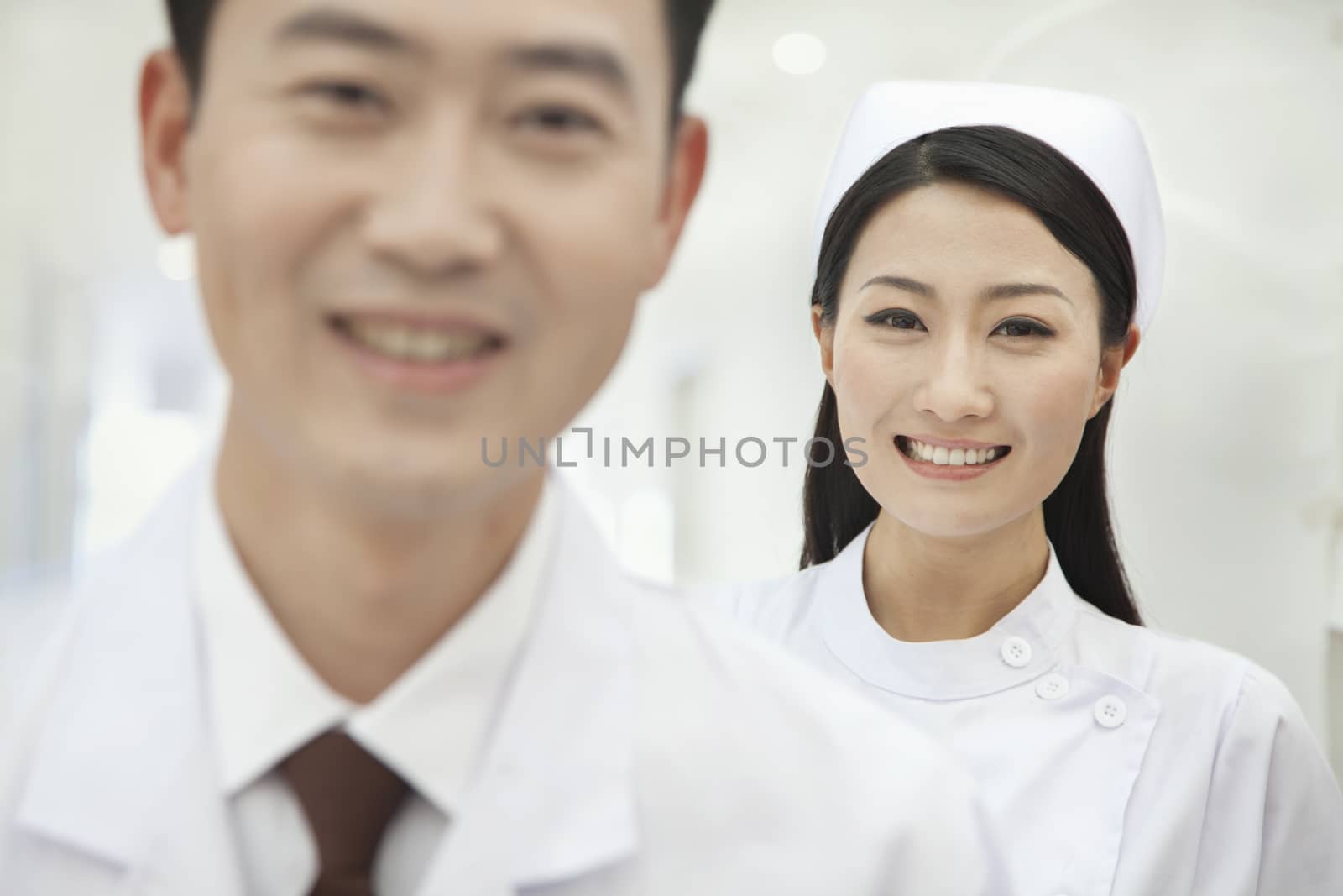 Portrait of Nurse, Doctor in Foreground