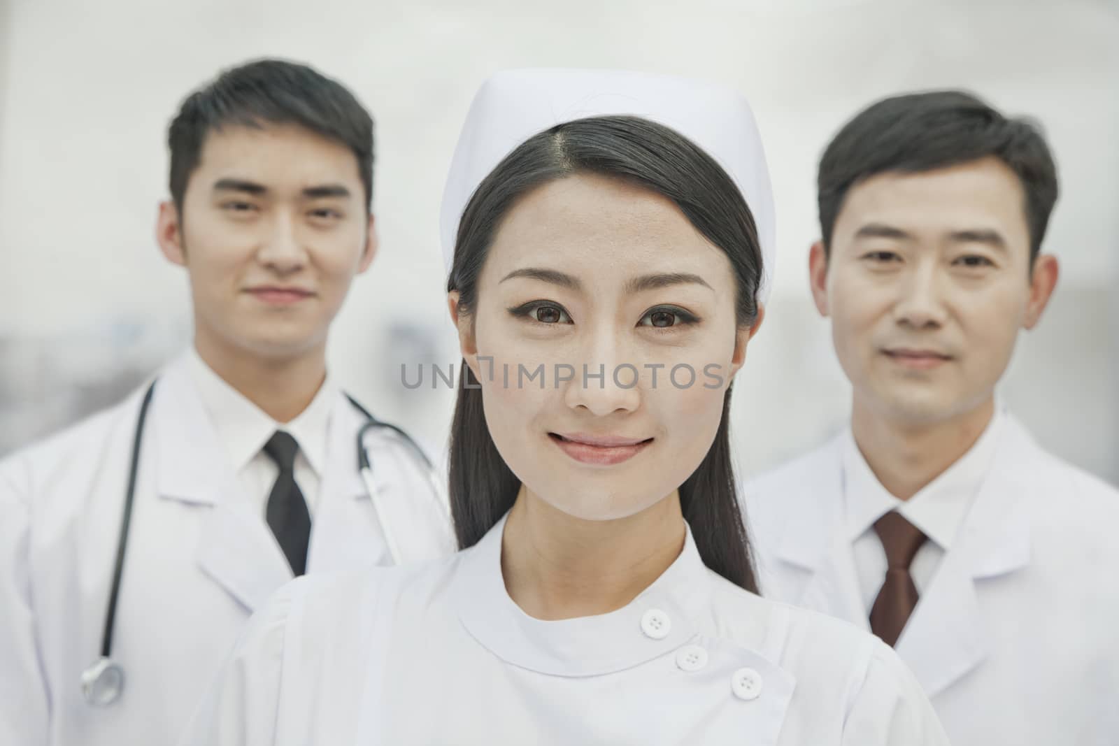 Portrait of Healthcare workers in China, Two Doctors and Nurse by XiXinXing