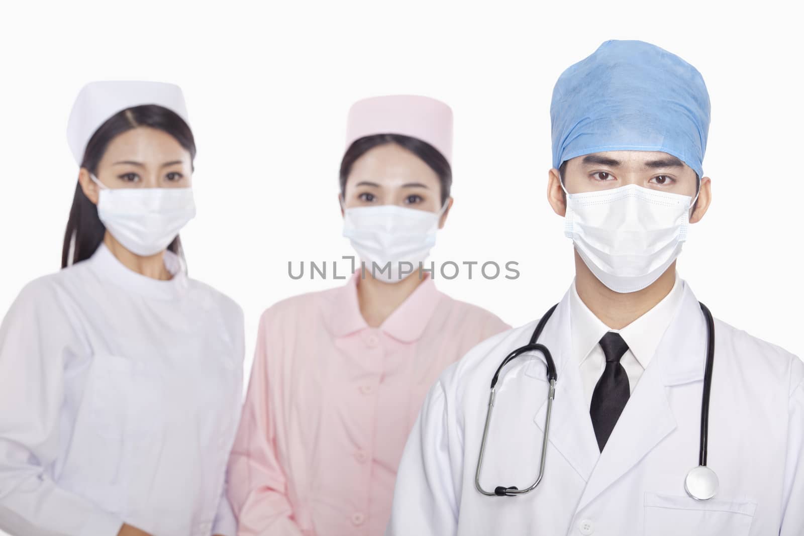 Portrait of Healthcare workers with surgical masks, studio shot