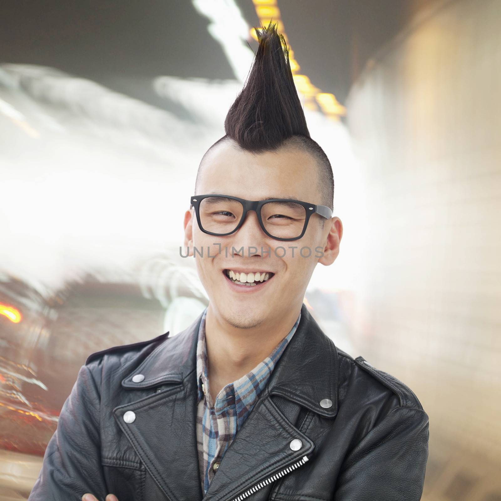 Young man with punk Mohawk smiling by XiXinXing