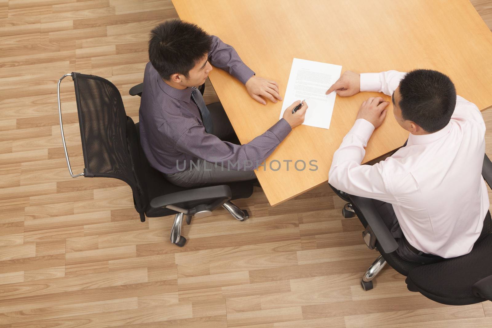 Worker signing the contract