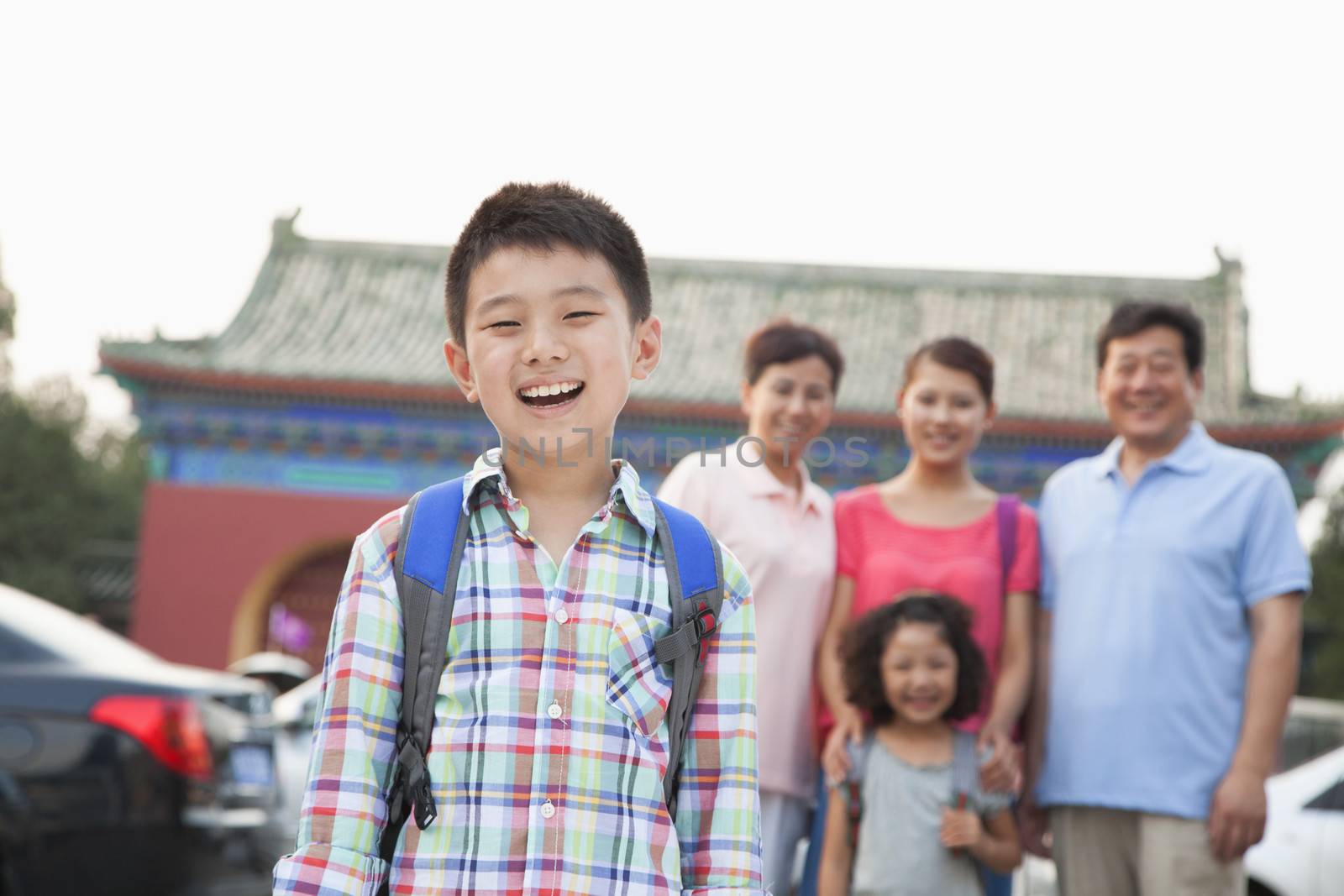 Portrait of boy with his family in the background by XiXinXing