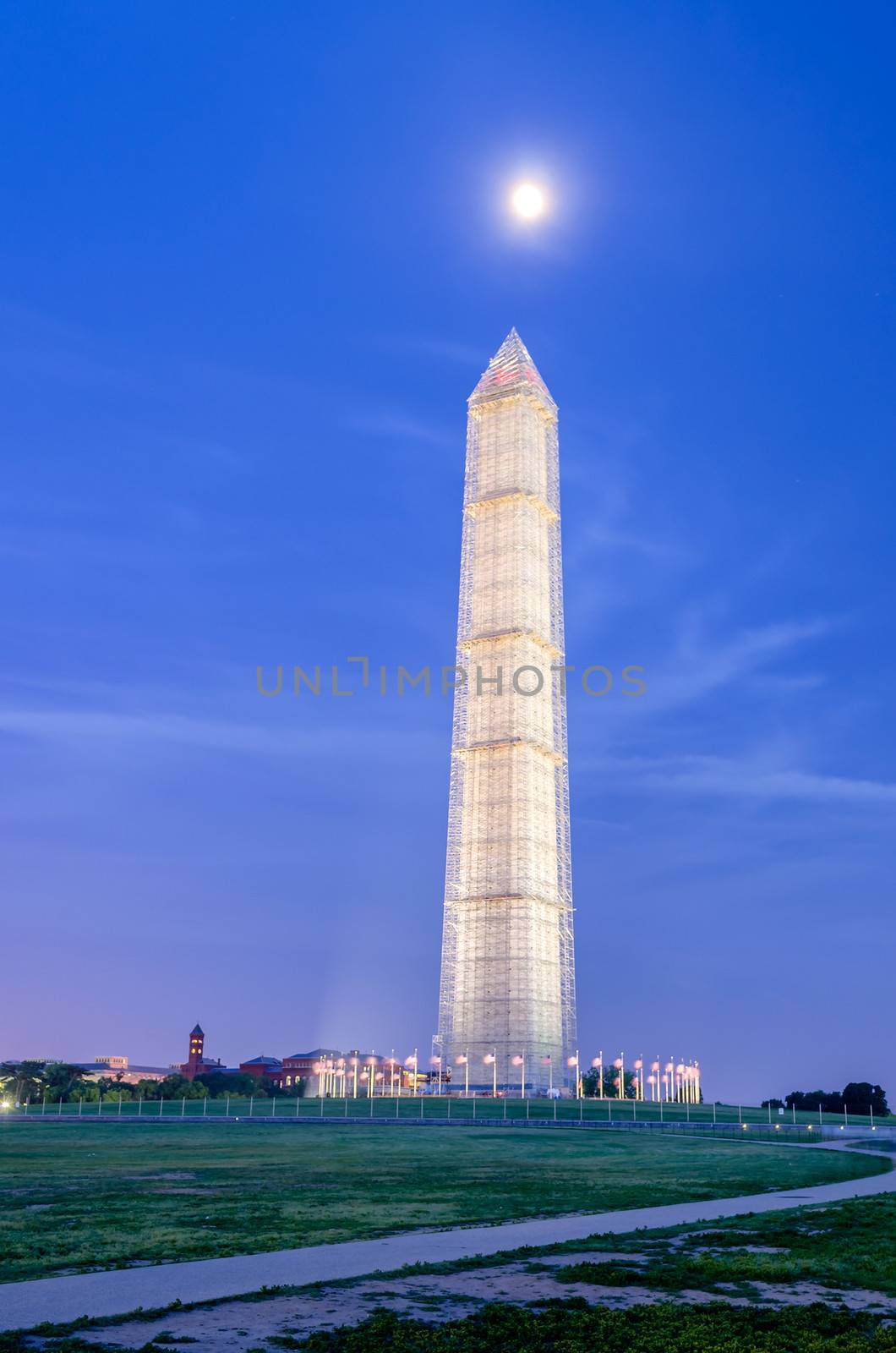 The Washington Memorial in Washington DC at Night against a scenic blue sky