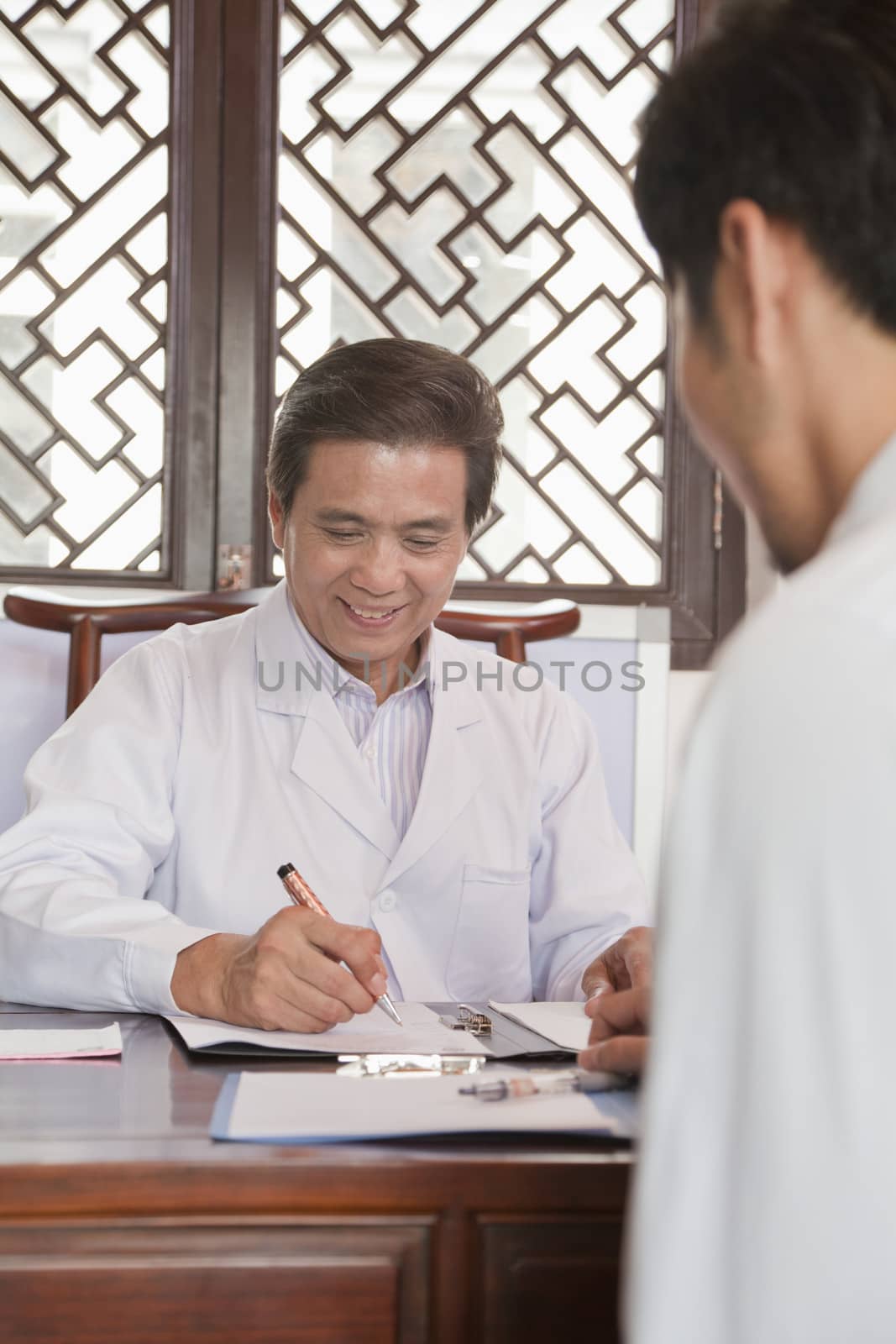 Doctor Meeting with a Patient