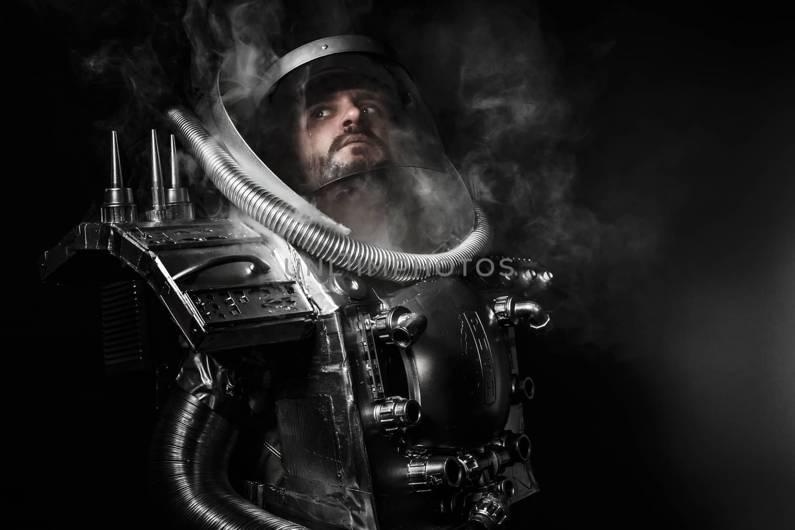 Astronaut, fantasy warrior with huge space weapon