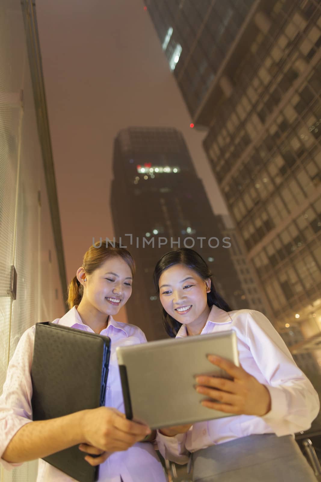 Young businesswomen working outdoor