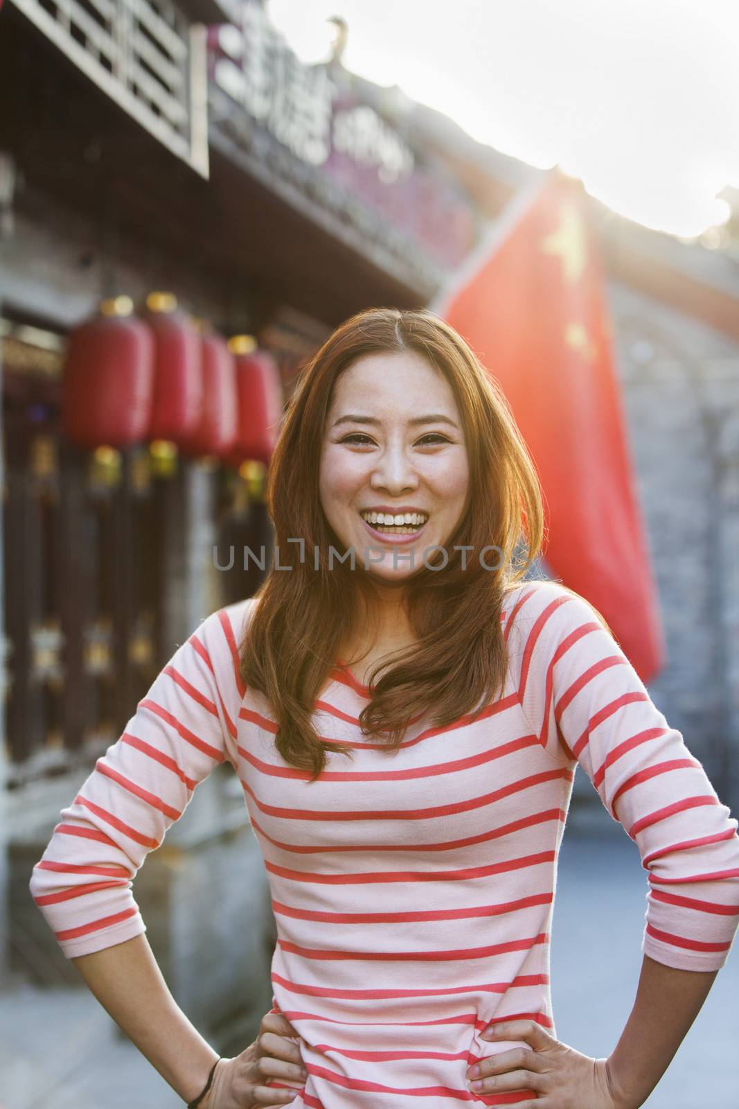 Portrait Of Smiling Young Woman In Houhai, Beijing