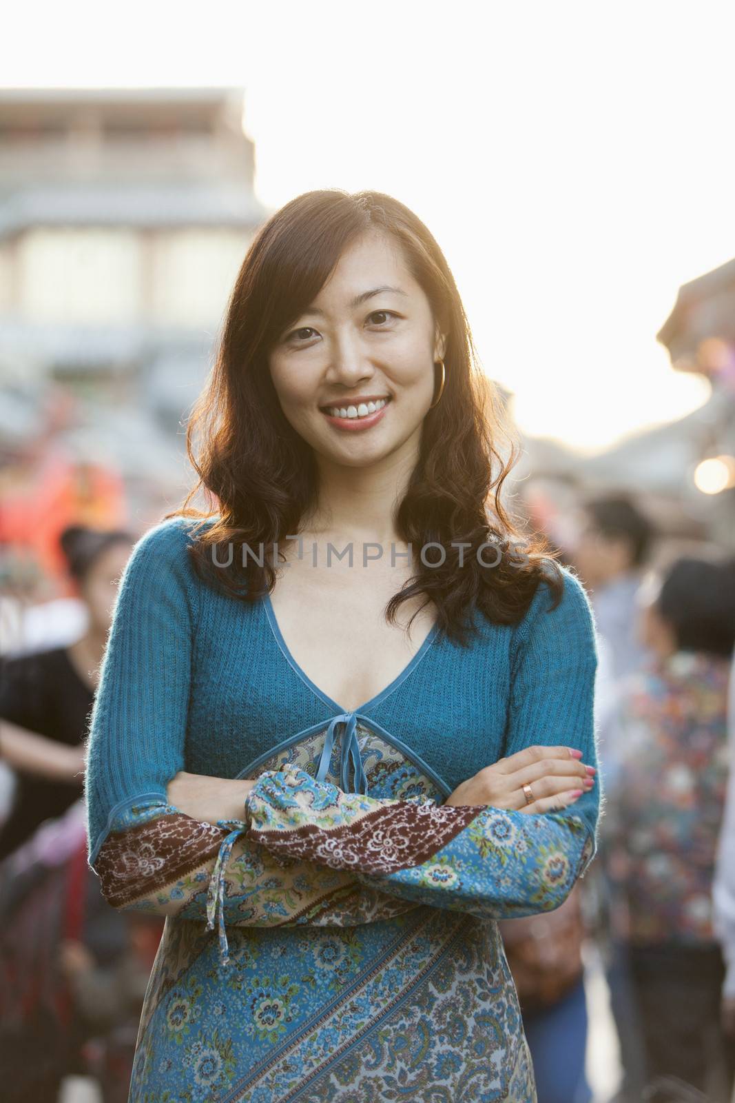 Portrait Of Smiling Mid Adult Woman In Houhai, Beijing