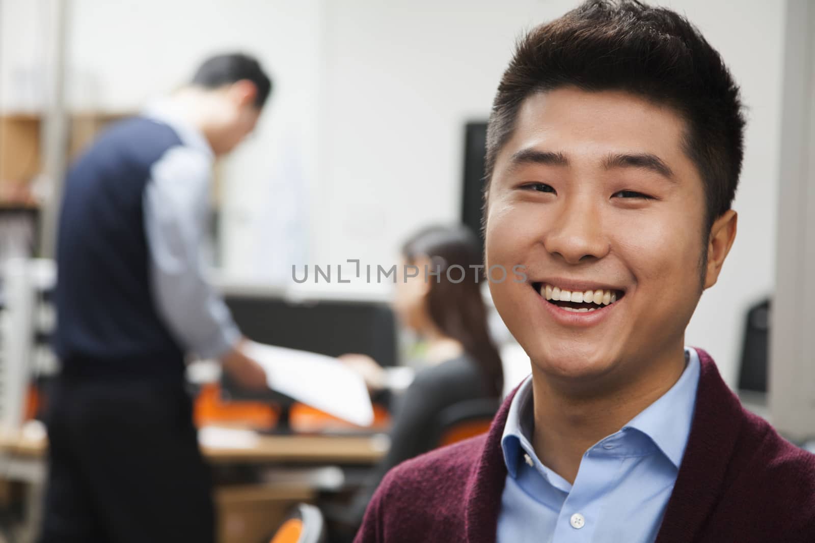 Portrait of young businessman in the office