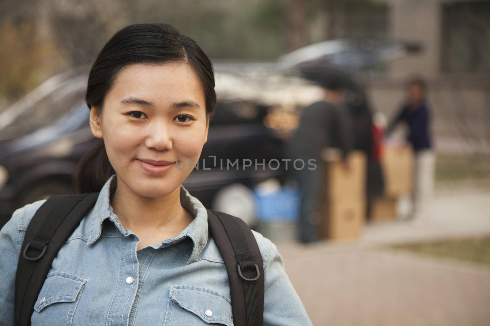 Student portrait in front of dormitory at college by XiXinXing