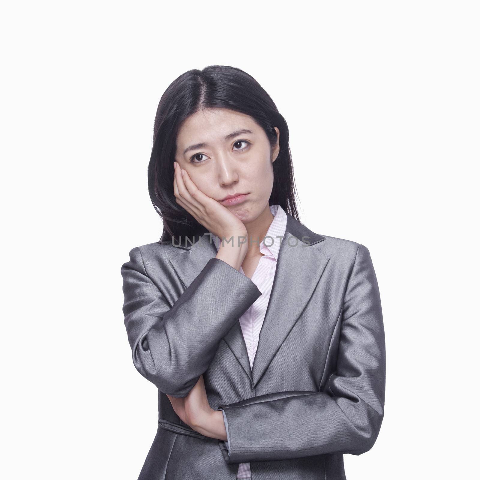 Businesswoman with sad expression by XiXinXing