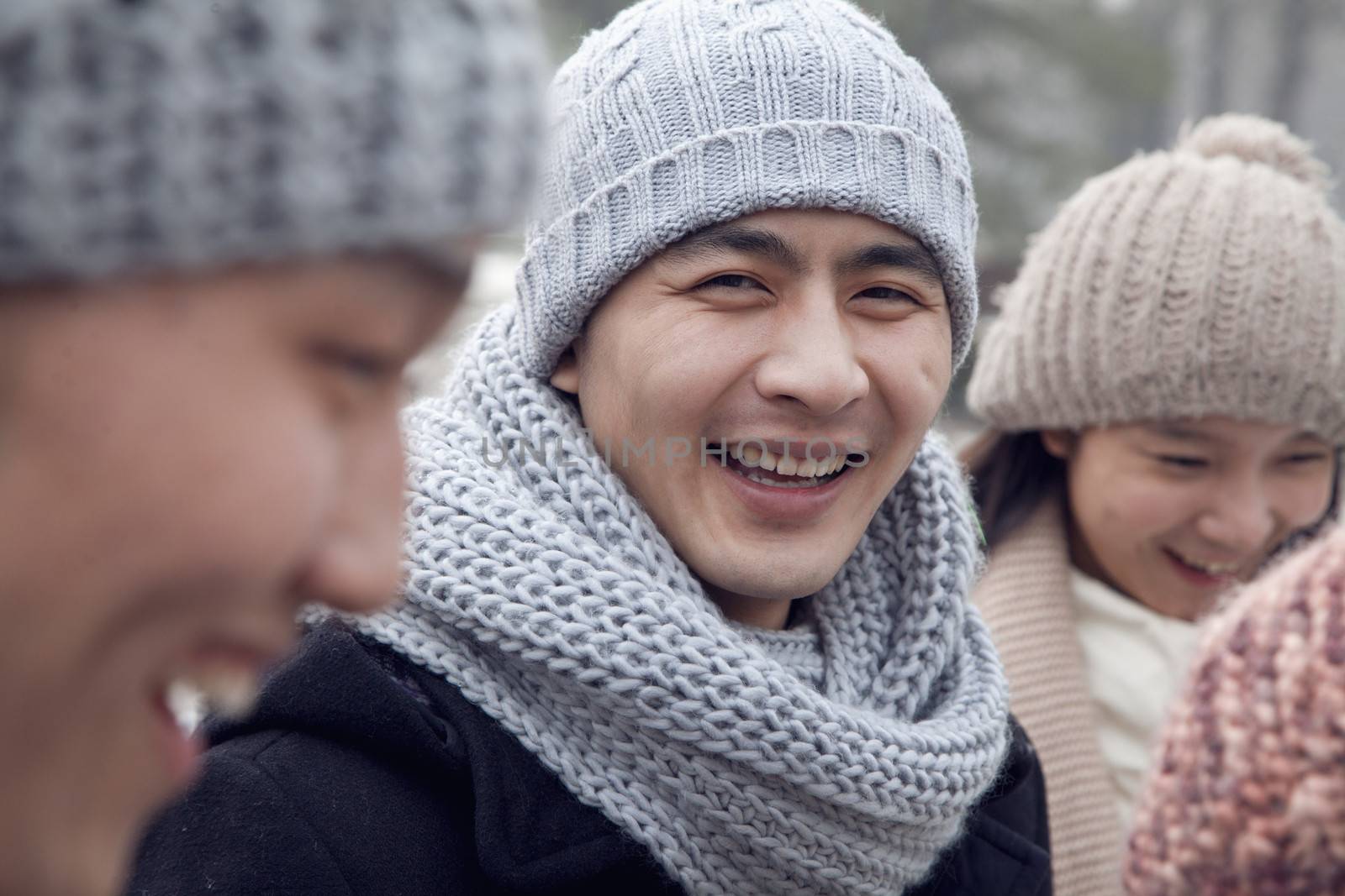 Portrait of Young Man in Winter with Friends by XiXinXing
