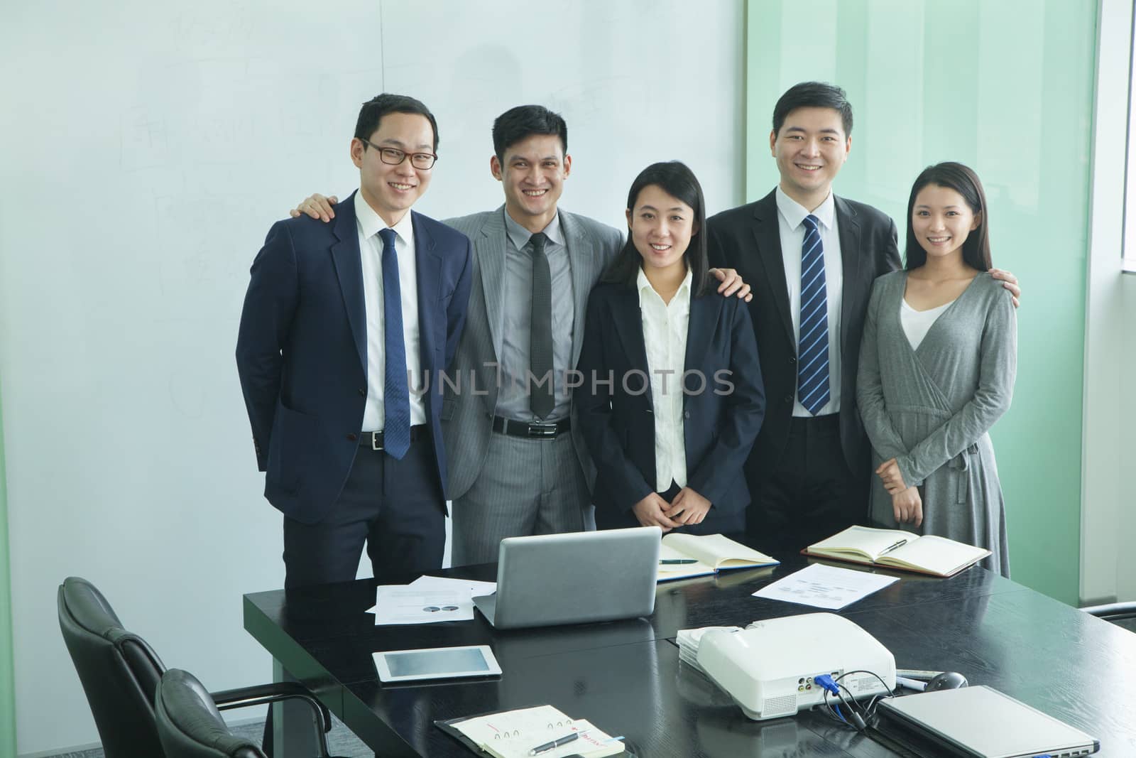 Businesspeople in Conference Room by XiXinXing