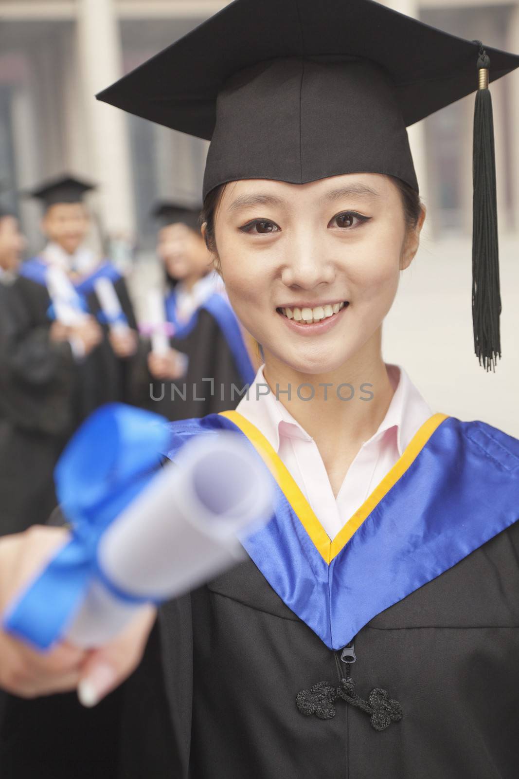 Young Female Graduate Holding Diploma by XiXinXing