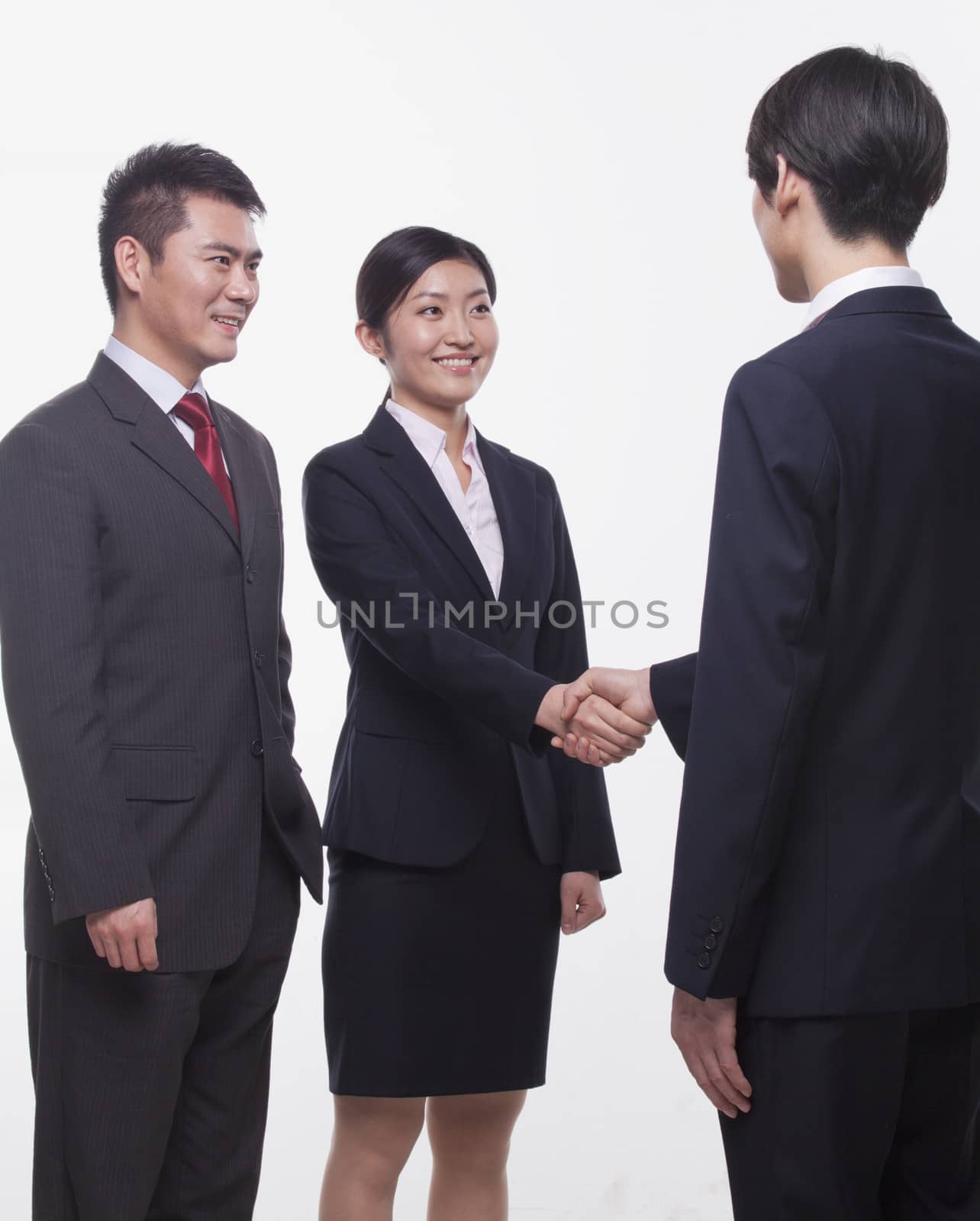 Businesspeople Meeting and Shaking Hands by XiXinXing