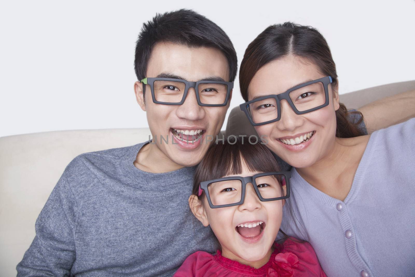 Portrait of Family wearing black glasses, studio shot by XiXinXing